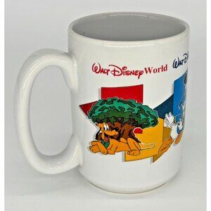 Walt Disney World Coffee Mug Four Parks One World Mickey Donald Goofy Pluto